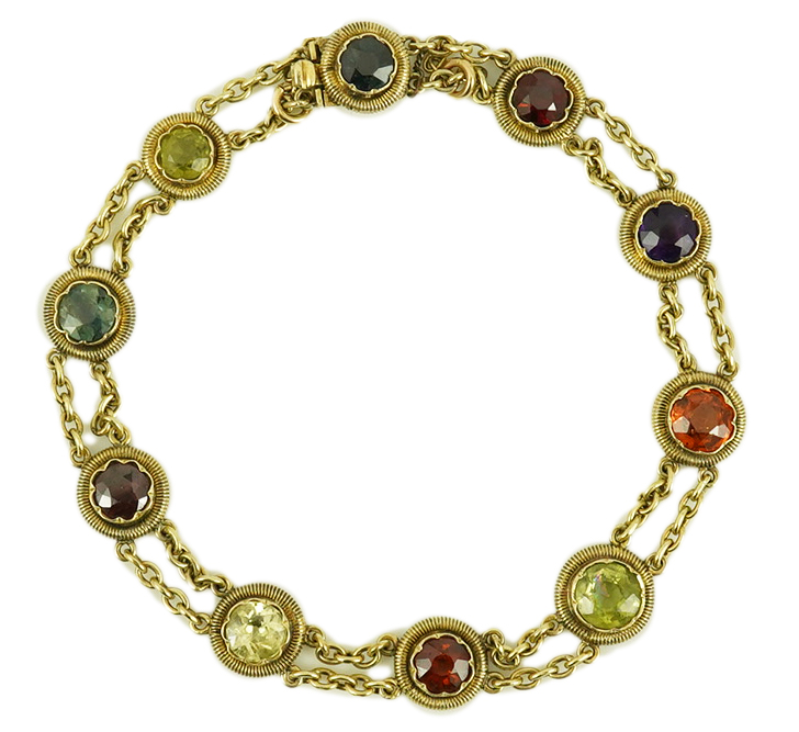 An early 20th century yellow metal and ten stone multi gem set chain link bracelet